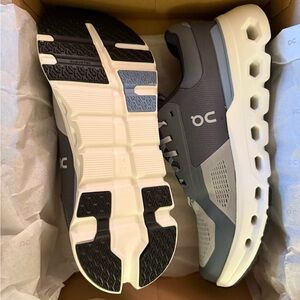 On Running Charcoal and White Athletic Shoes